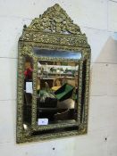 Very decorative brass & glass framed wall mirror, part bevel-edged glass, 95 x 55cms. Estimate £40-