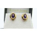 Yellow metal amethyst earrings with 9ct gold backs. Estimate £10-20