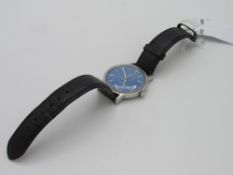 Omega Geneva wristwatch, 17 jewels, hand-winding, blue dial with silver hands & indices, date window