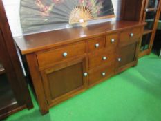 Oak sideboard of 6 drawers & 2 cupboards with blue ceramic knobs, by Halo, 180 x 56 x 77cms.