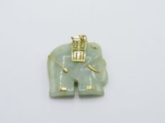 9ct gold mounted green jade elephant pendant. Estimate £15-20