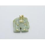 9ct gold mounted green jade elephant pendant. Estimate £15-20