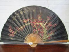 Large oriental hand-painted paper fan, 163 x 86cms. Estimate £20-40