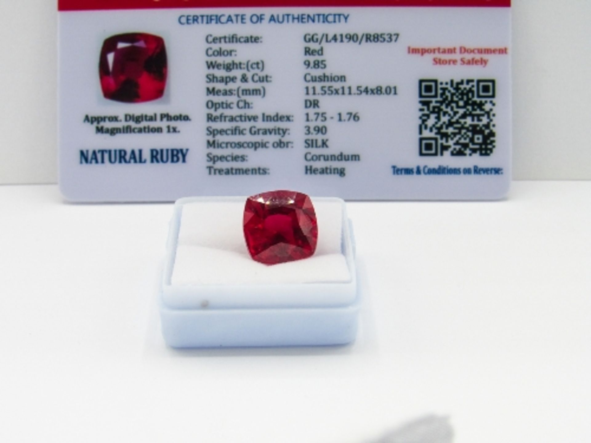 Cushion cut loose red ruby, weight 9.85ct, with certificate. Estimate £40-50