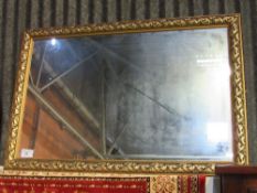 Gilt framed wall mirror.