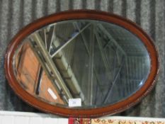 Mahogany framed oval bevel edge wall mirror, 61 x 85cms. Estimate £10-20