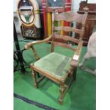 Oak ladder back open armchair with drop-in seat. Estimate £10-20