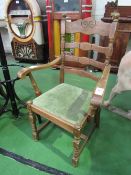 Oak ladder back open armchair with drop-in seat. Estimate £10-20