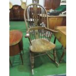 Windsor style rocking chair. Estimate £40-50