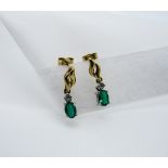 Pair of green stone earrings. Estimate £50-60