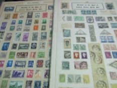 A box of Carters Seeds office display of approx. 14,000 World used postage stamps stuck