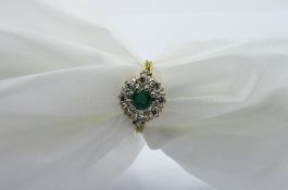 18ct gold cluster ring with centre emerald surrounded by diamonds, weight 3.8gms, size P.