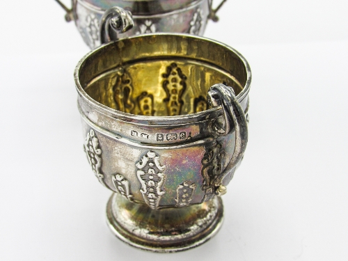 Silver hallmarked double ended egg cup, London 1904 & a pair of small silver double handled urns, - Image 3 of 3