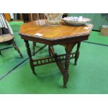 Mahogany octagonal table with cross stretchers, on casters, 86 x 80 x 71cms. Estimate £25-50