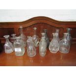 14 various Victorian moulded & crystal glass decanters, without stoppers. Estimate £20-30