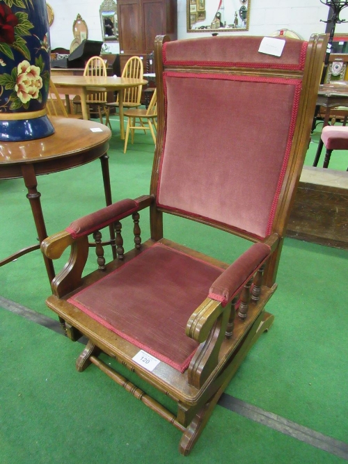 Mahogany upholstered American-style rocking chair. Estimate £20-40