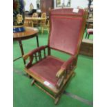 Mahogany upholstered American-style rocking chair. Estimate £20-40
