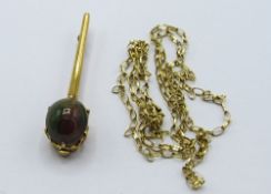 Black opal pendant set in yellow metal on a 9ct gold chain, weight 3.1gms. Estimate £300-320