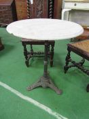 Marble top circular table on cast iron pedestal base, diameter 60cms. Estimate £30-40