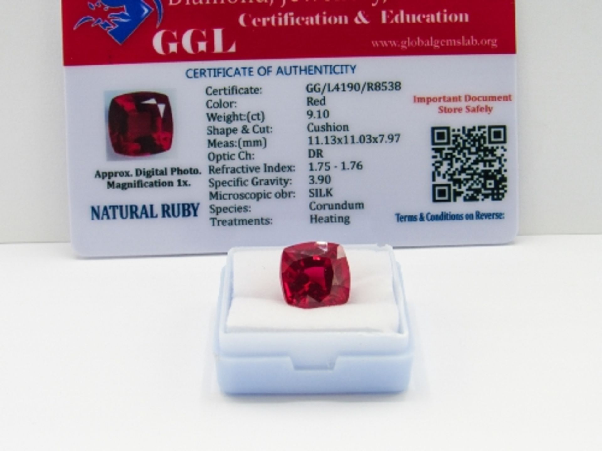 Cushion cut loose red ruby, weight 9.10ct, with certificate. Estimate £40-50