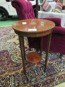 Mahogany inlaid circular display table with under shelf, 43cms diameter x 67cms, together with 2