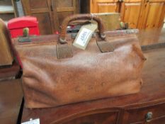 Leather Gladstone bag with contents