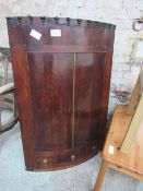 Mahogany bow front corner cabinet with 3 shelves to base