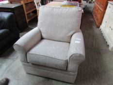 Upholstered armchair