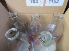 5 old style advertising milk bottles