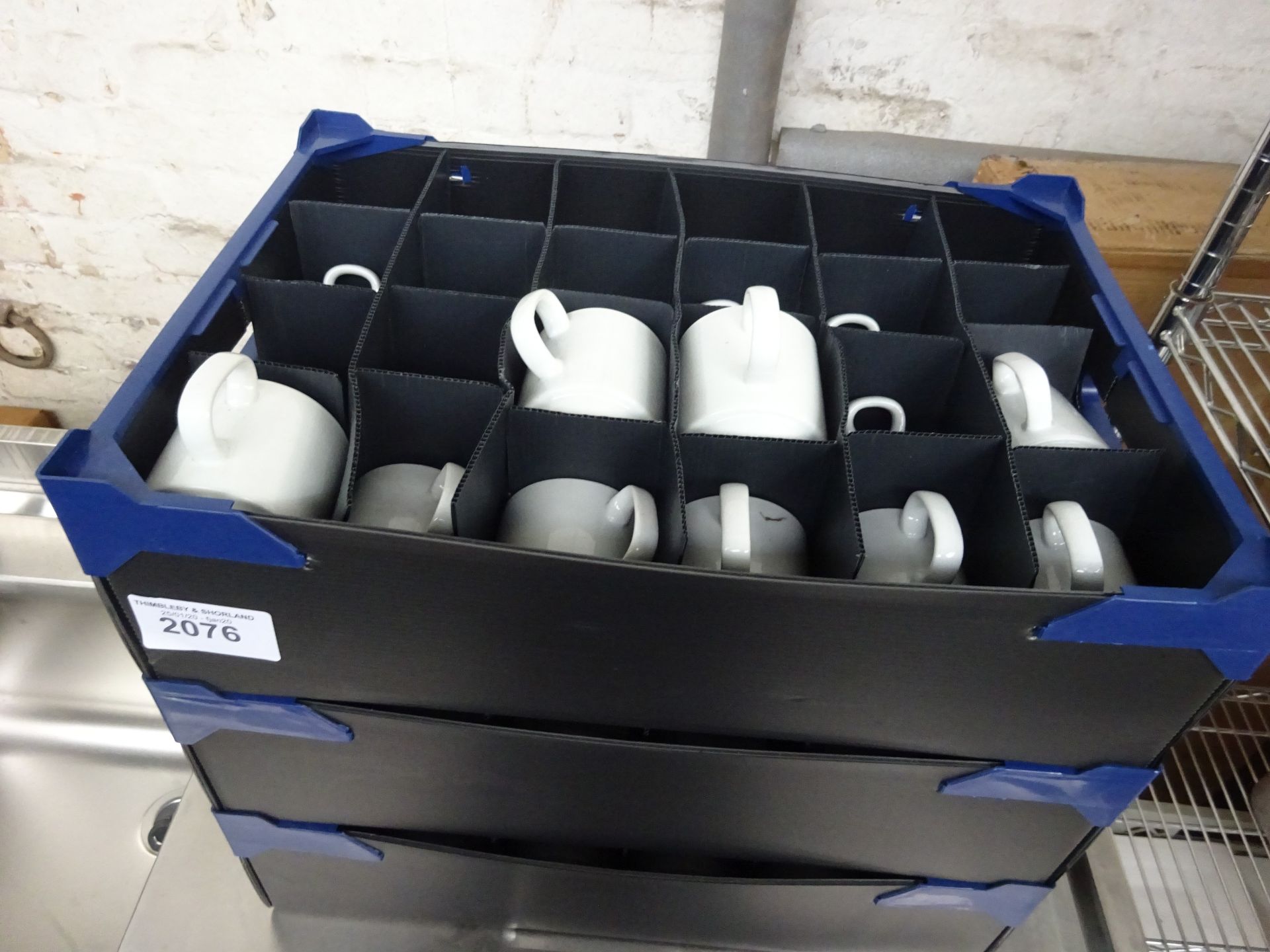 3 trays of white mugs/cups