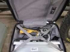 Suitcase containing Wolfe floor/tiling mitre saw