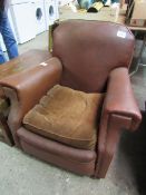 Brown faux leather armchair