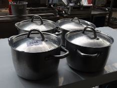 4 stainless steel cooking pots with lids