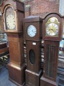 3 long case clocks