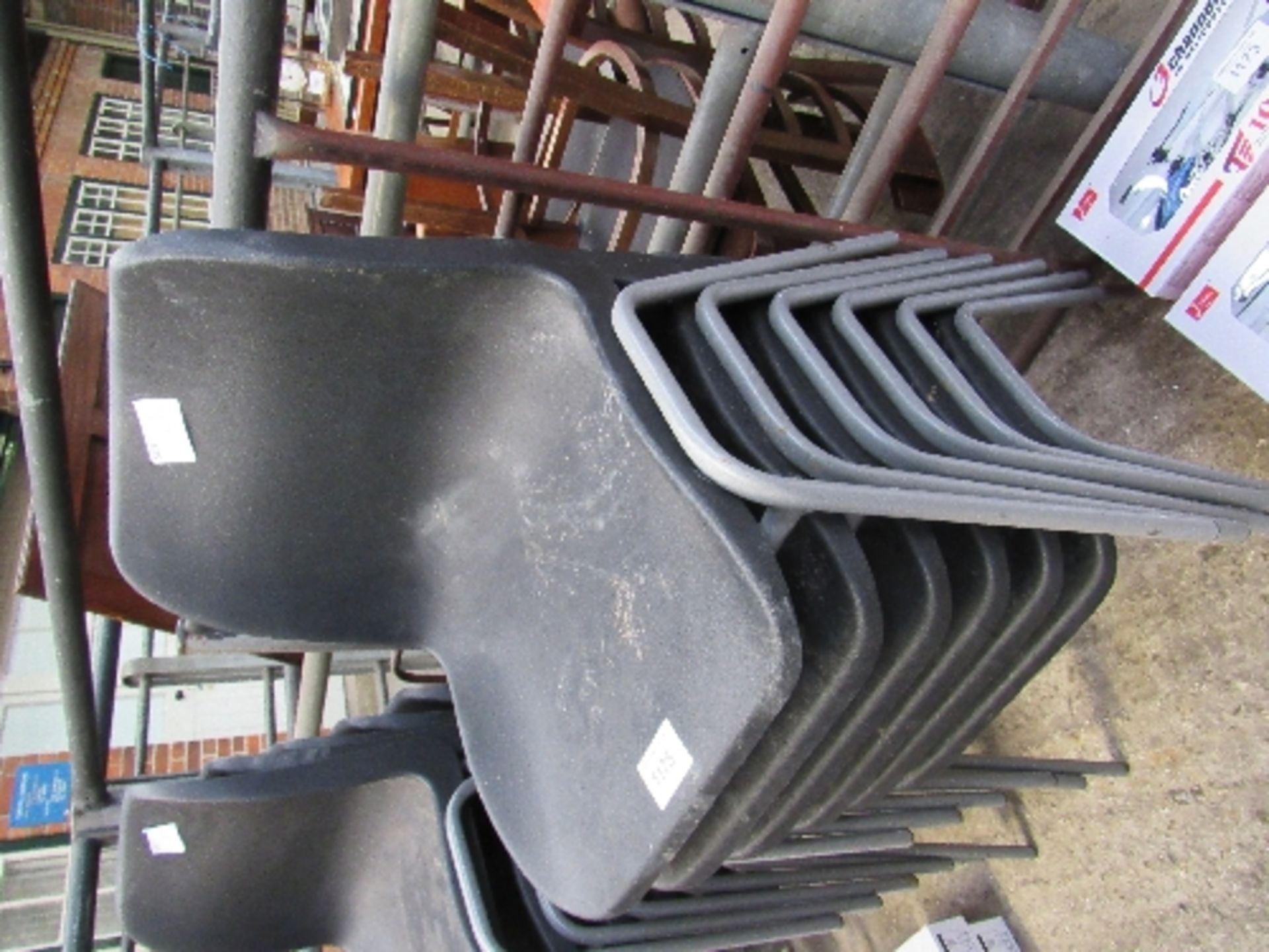 6 plastic stacking chairs