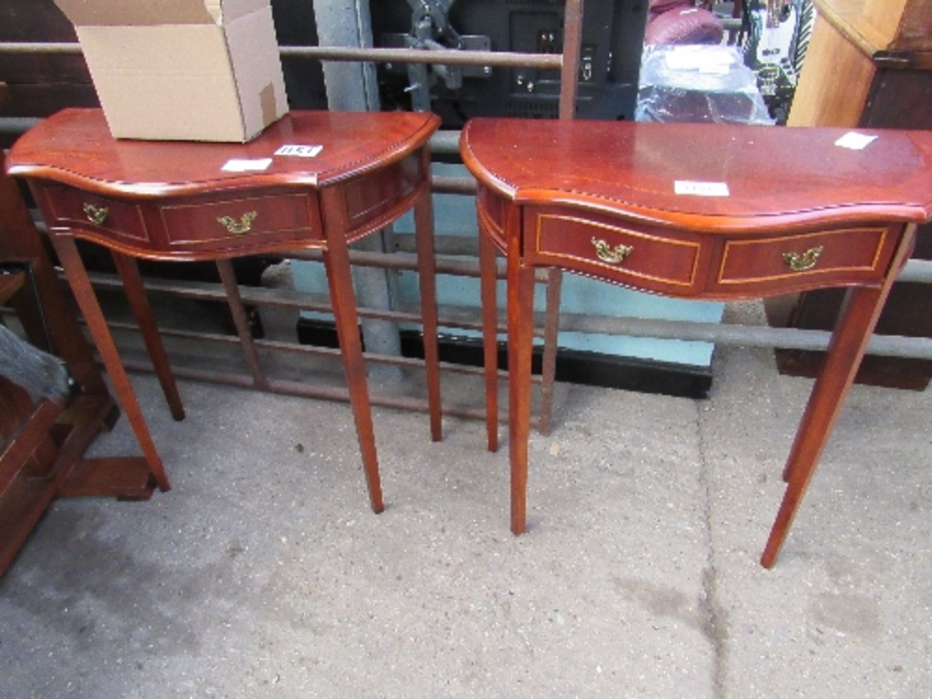 Pair of mahogany console tables