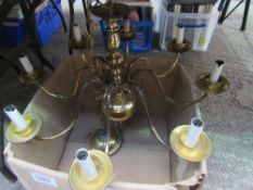 Brass chandelier complete with glass lampshades