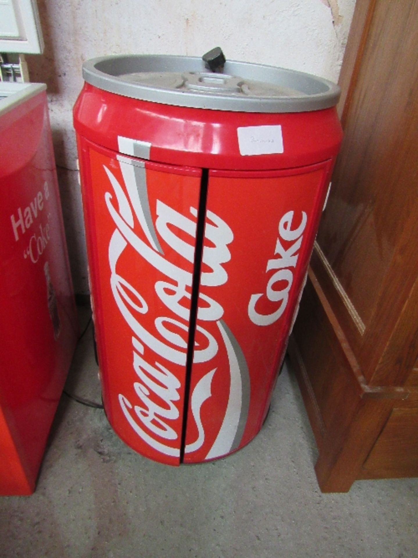 Music centre in the form of a coke can