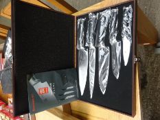 Damascus knife set in a case