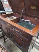 Concert Grande wind up gramophone in an oak cabinet, & records. Working