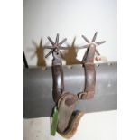 Two large rowelled spurs