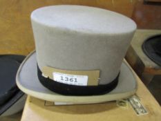 A grey top hat by Moss Bros