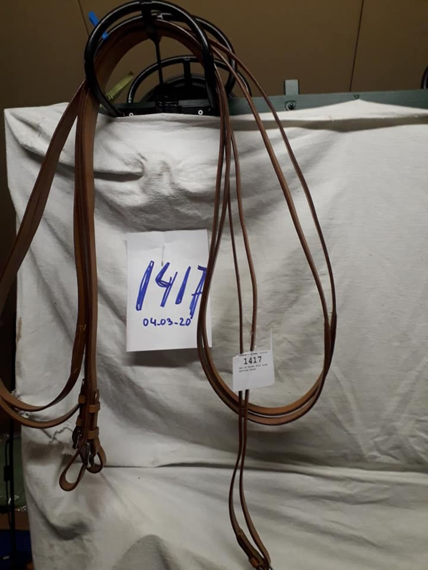 Set of brown full size driving reins