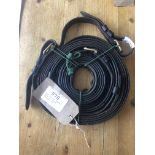 Pair of black leather reins with brass fittings, 6ft