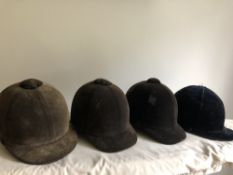 Four vintage riding hats