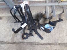 Three heavy horse harness racks