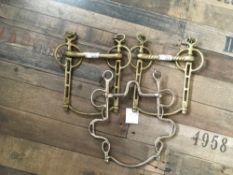 Pair of straight bar nickel Liverpool bits with crossbars, 5.25 and Buxton bit with high port, 5.