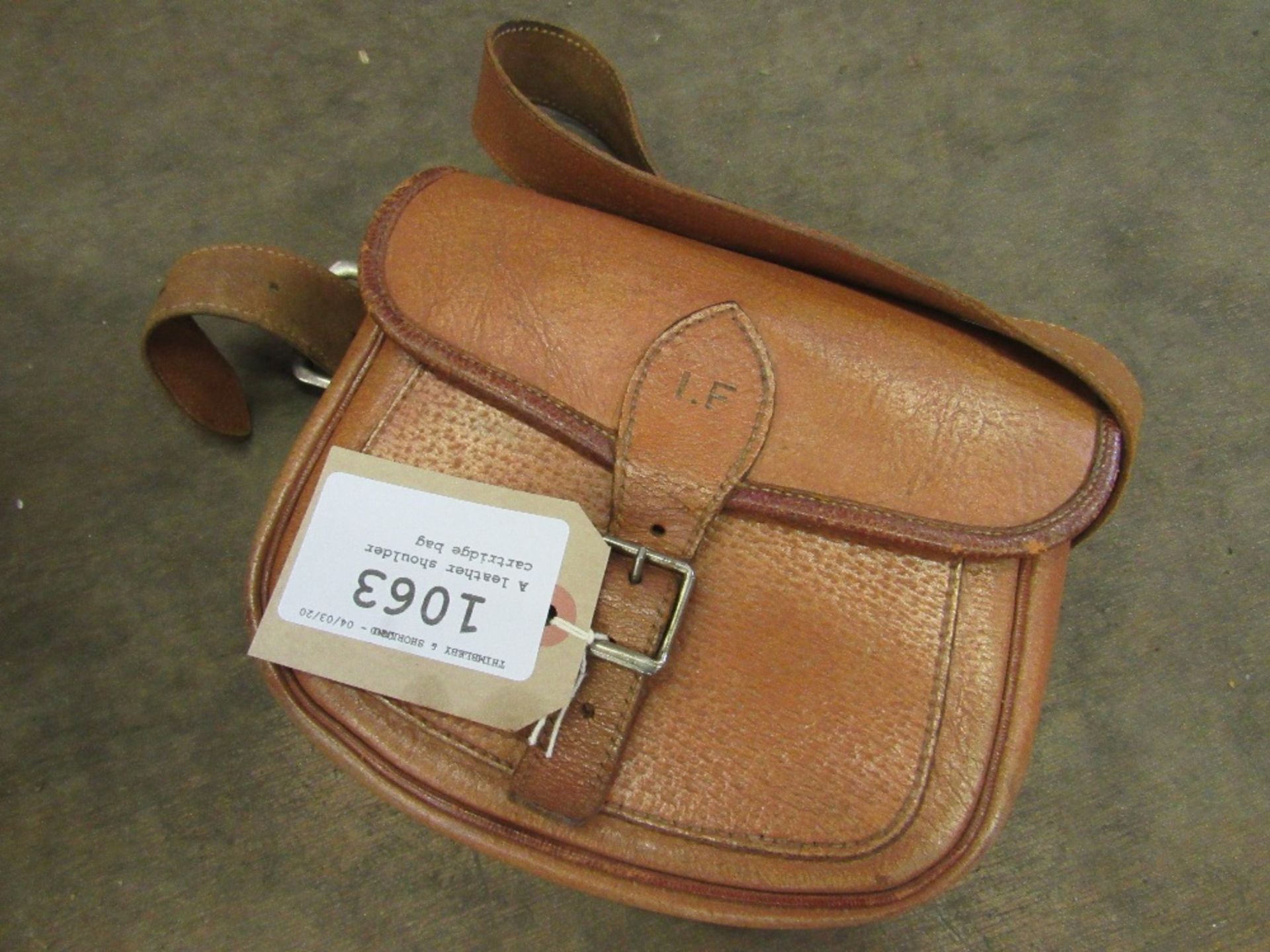 A leather shoulder cartridge bag