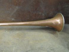 An original copper/nickel silver four-in-hand pattern coach horn, approx. 47ins long (view in