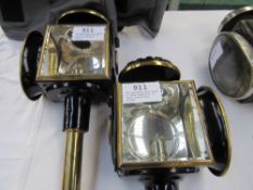 Two matching show lamps in show condition in their protective sleves.